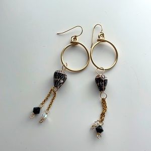 Gold dangle earrings with shells attached